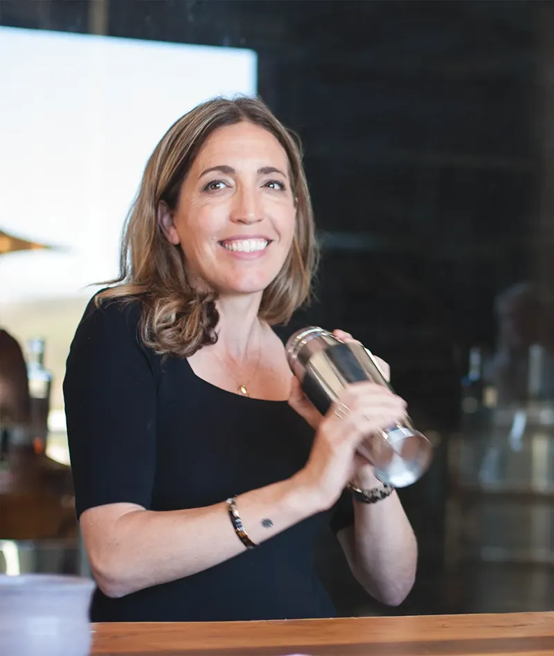 Sarah Suput shakes up a fresh cocktail for guests at the Rock 12 tasting room.