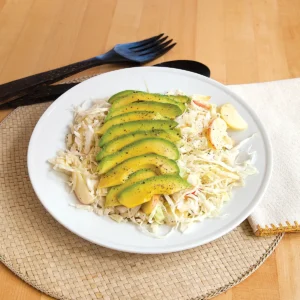 Plated apple avocado salad.