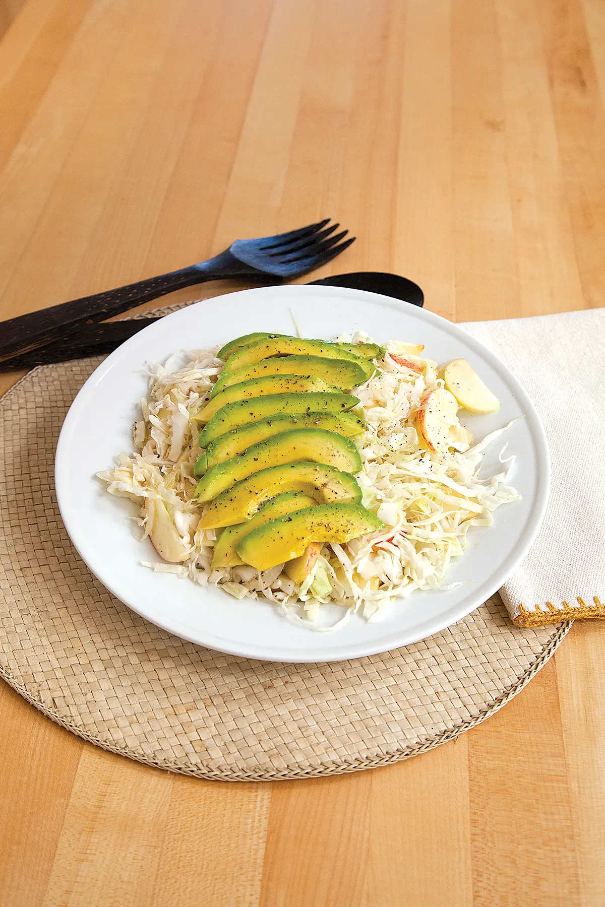 Plated apple avocado salad.