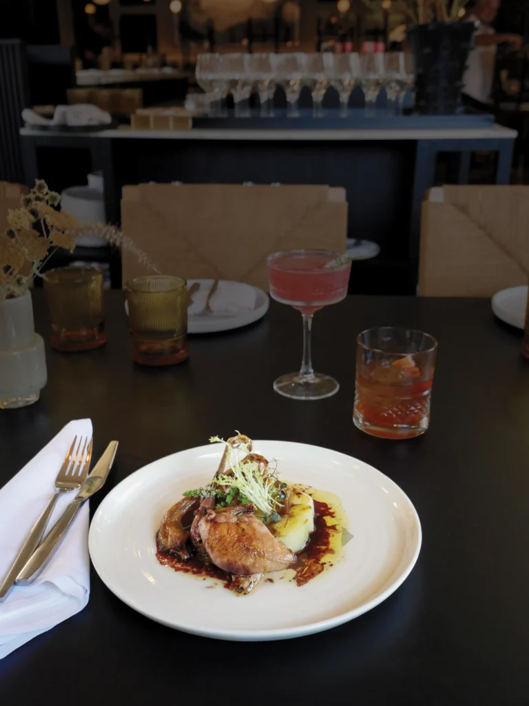 Local Quail with Leeks and Ginger Soy Pomegranate Sauce.