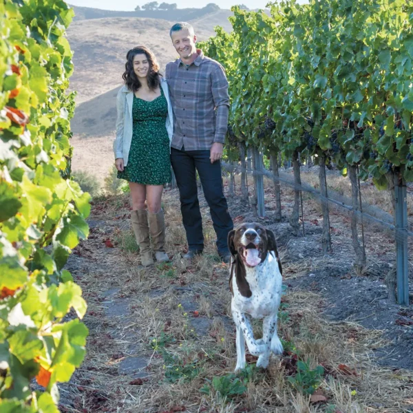 Jesse and Avery Cloutier with their dog Aussie.