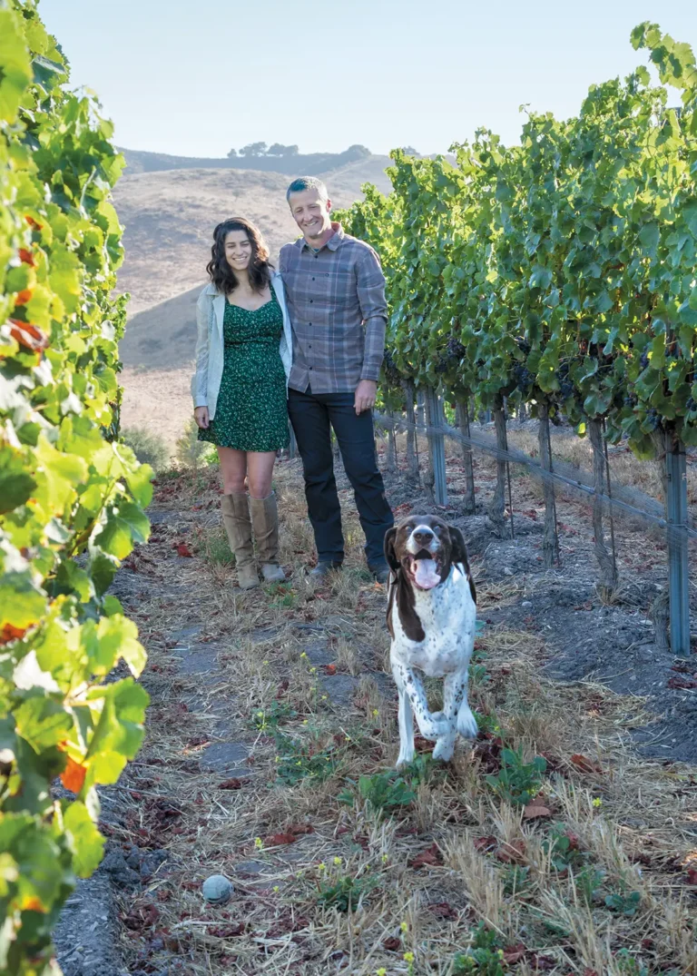 Jesse and Avery Cloutier with their dog Aussie.