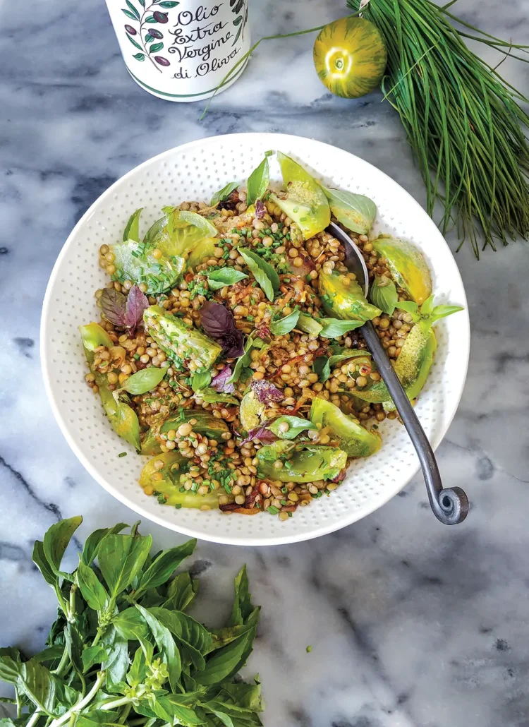 A bowl of Lentils with Glazed Onions and Green Tomatoes.