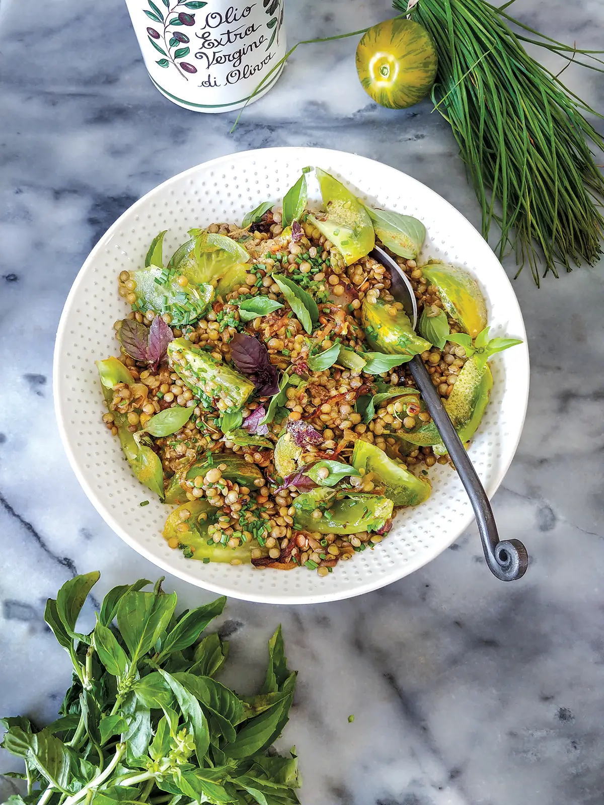 A bowl of Lentils with Glazed Onions and Green Tomatoes.