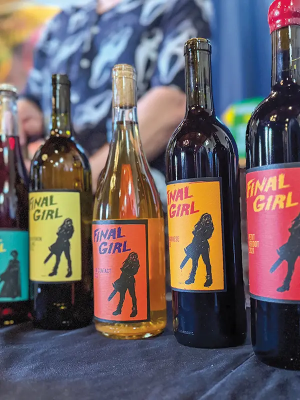 Bottles of Final Girl wine on a table.