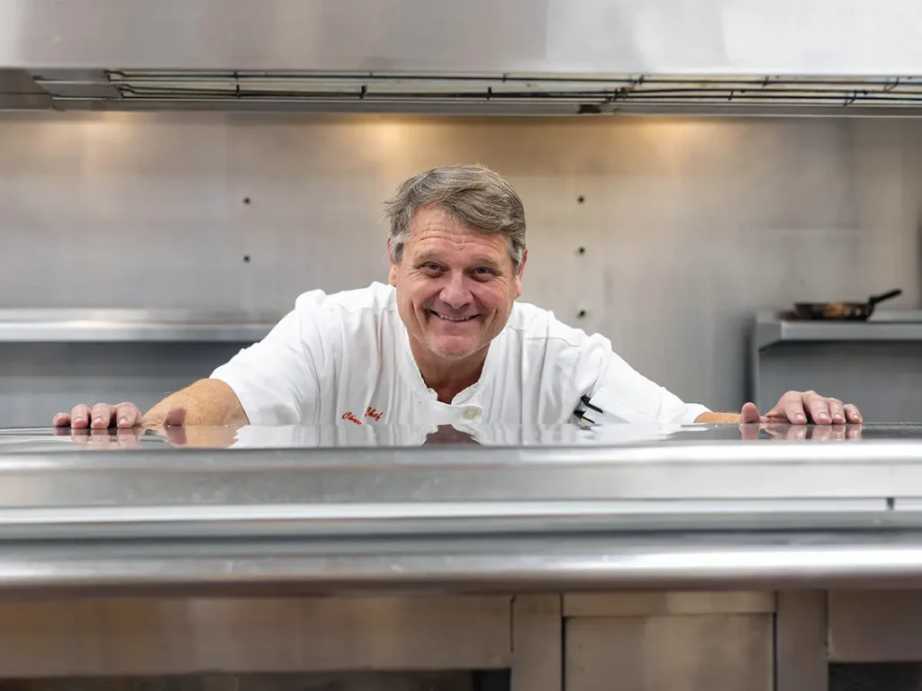 Chef Charlie at the pass through.