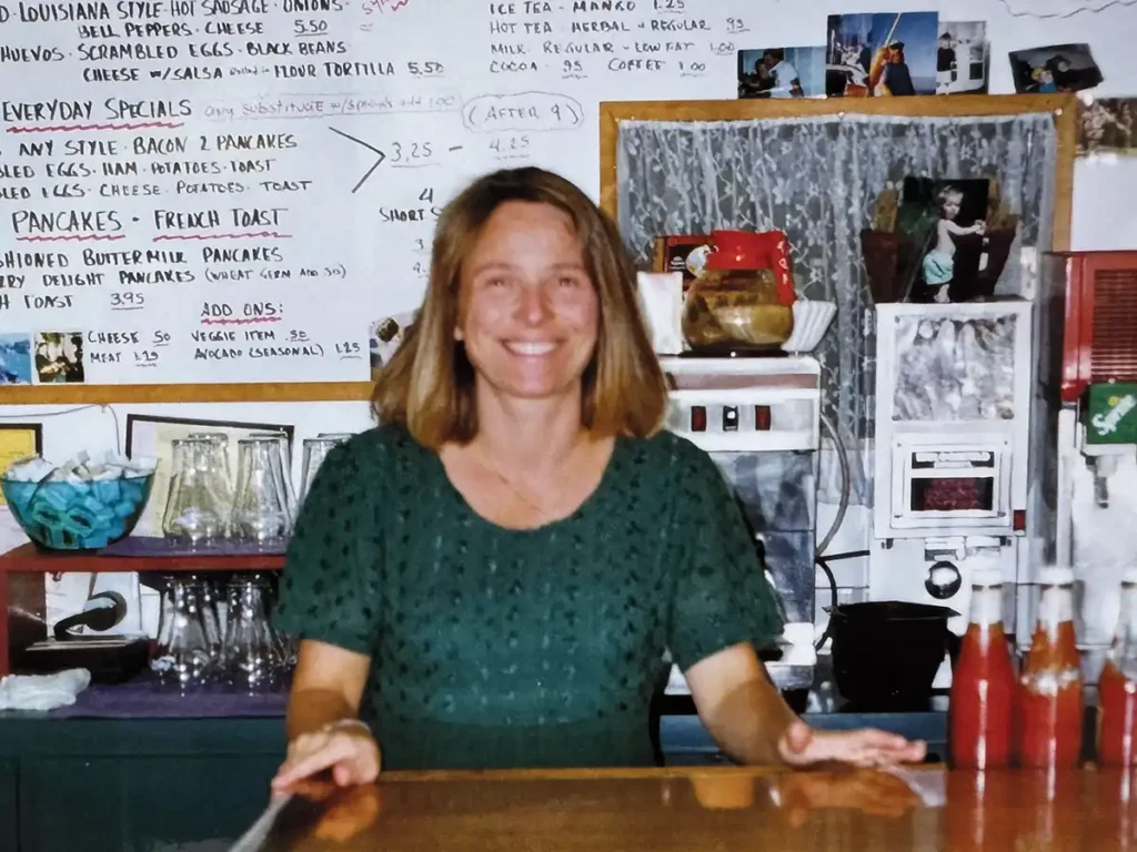 Maya Schoop-Rutten behind the counter at The Comeback Café.