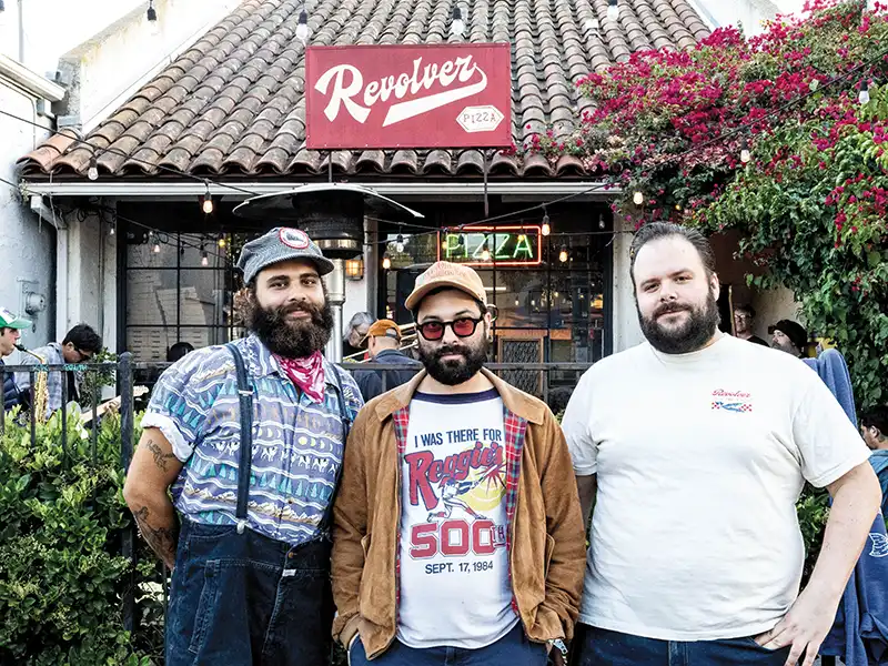 James Cofrancesco, Nick Bodden and Ron Allen in front of Revolver Pizza.