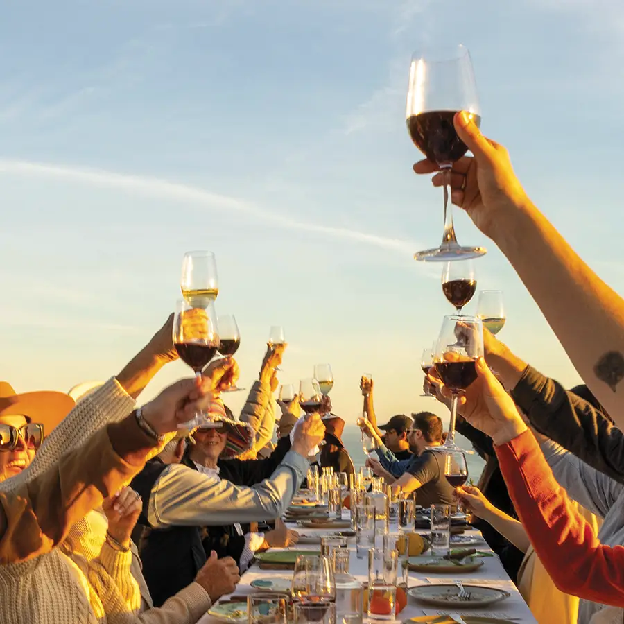 Diners raise a toast at Outstanding in the Field.