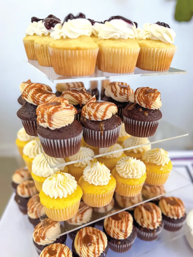 Four tiers of cupcakes.