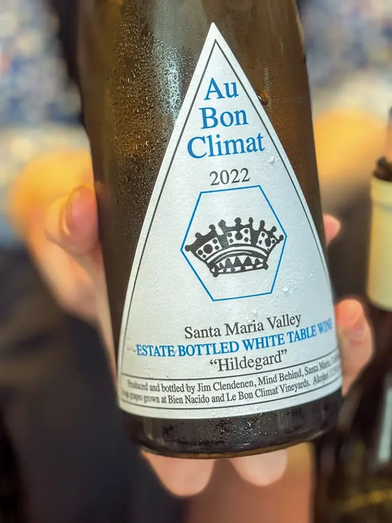 Outstretched hand with a bottle of 2022 ABC Hildegard.