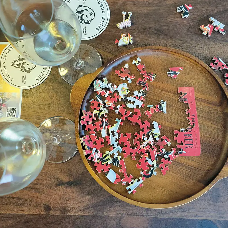 Hand cut puzzle and wine at the Loubud tasting room.