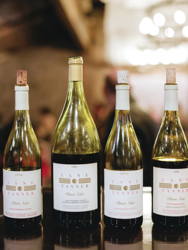 Four bottles of Lane Tanner Pinot Noir.