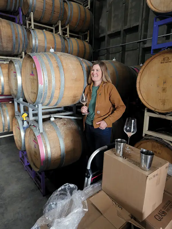 Laura Hughes amidst the ritual of harvest.