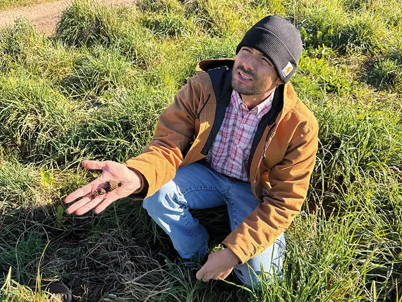 Stefan Selbert looks up at Las Cumbres Ranch.