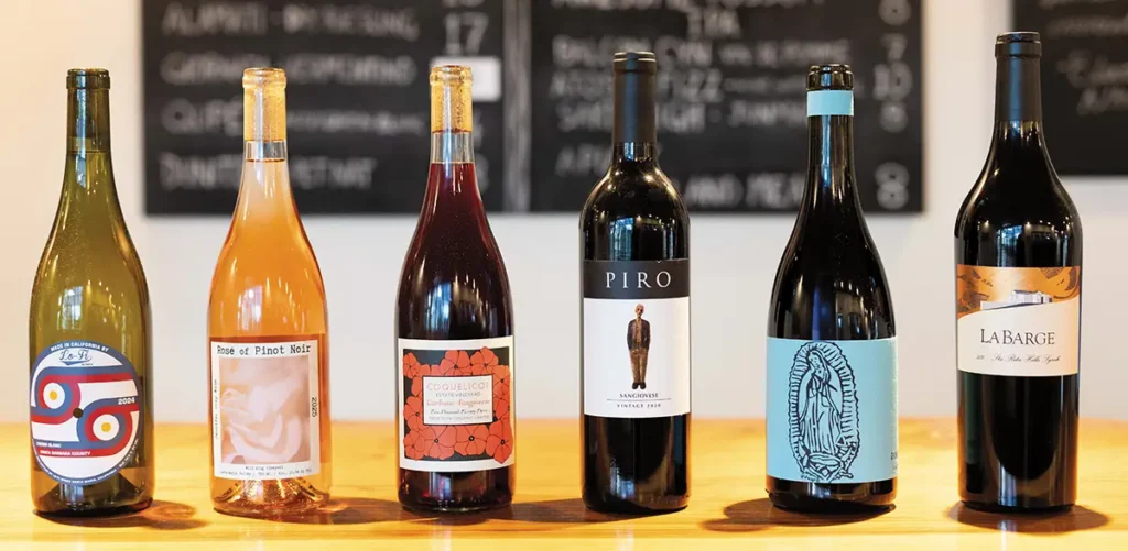 A lineup of 6 bottles of wine, representing Doug's picks for Summer 2026.