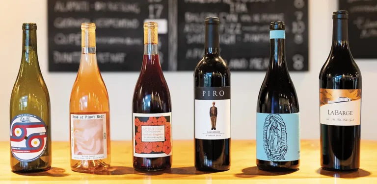 A lineup of 6 bottles of wine, representing Doug's picks for Summer 2026.