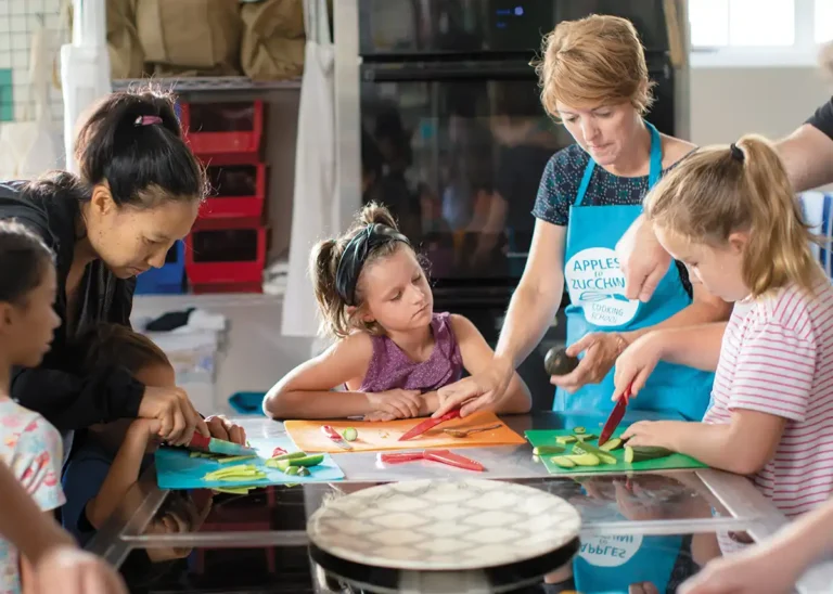 Children learn to cook at Apples to Zucchini Cooking School.