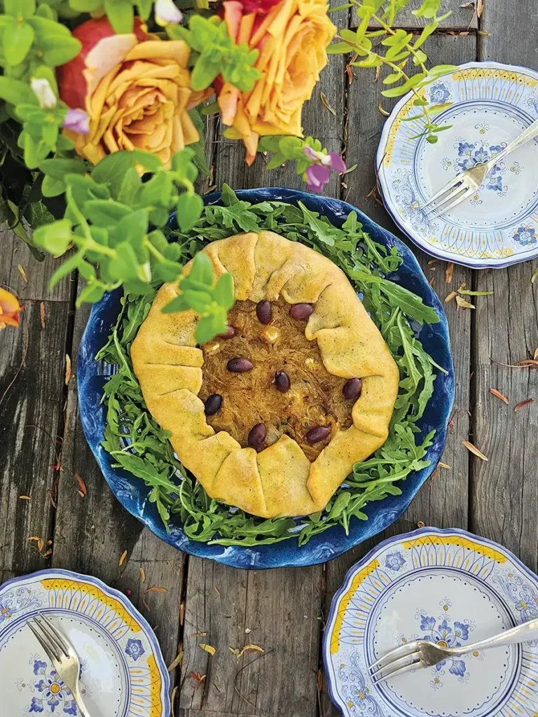 Caramelized Onion Galette set on a wooden table.