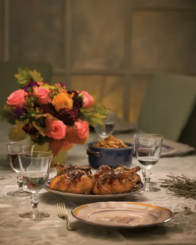 Table setting featuring Lavender and Honey Roasted Cornish Hens.