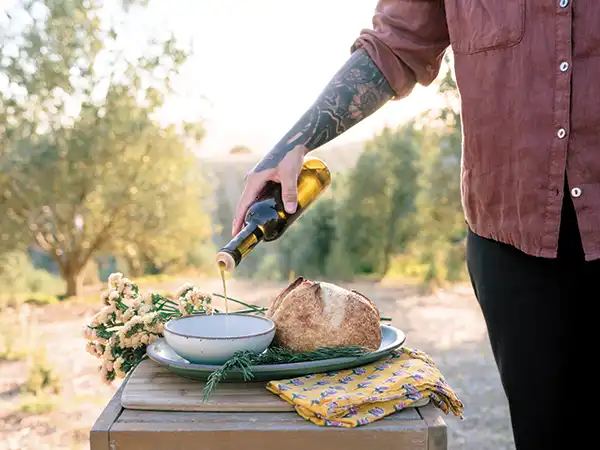 Yamashiro serves Luretík olive oil in Magistro’s olive grove.